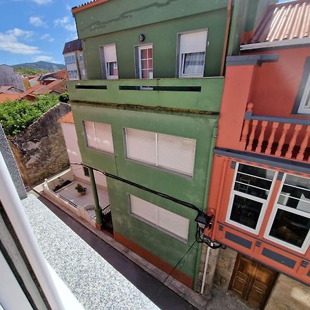 Apartamentos Costa Da Morte Muxia Exteriér fotografie A view of the narrow streets of the city of Funchal
