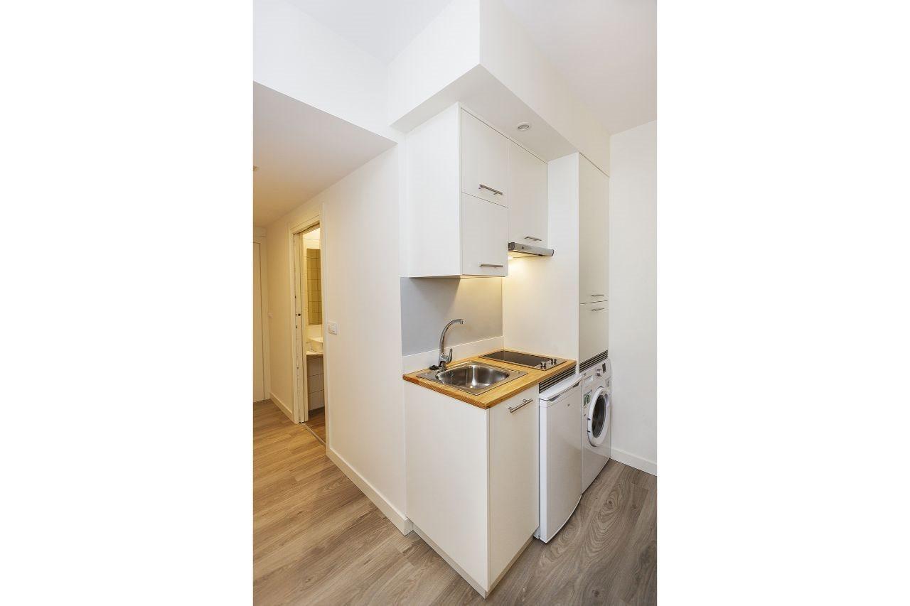 Apartamentos Costa Da Morte Muxia Exteriér fotografie A kitchenette in a micro apartment