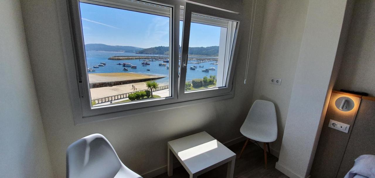 Apartamentos Costa Da Morte Muxia Exteriér fotografie View of the bay from a hotel room