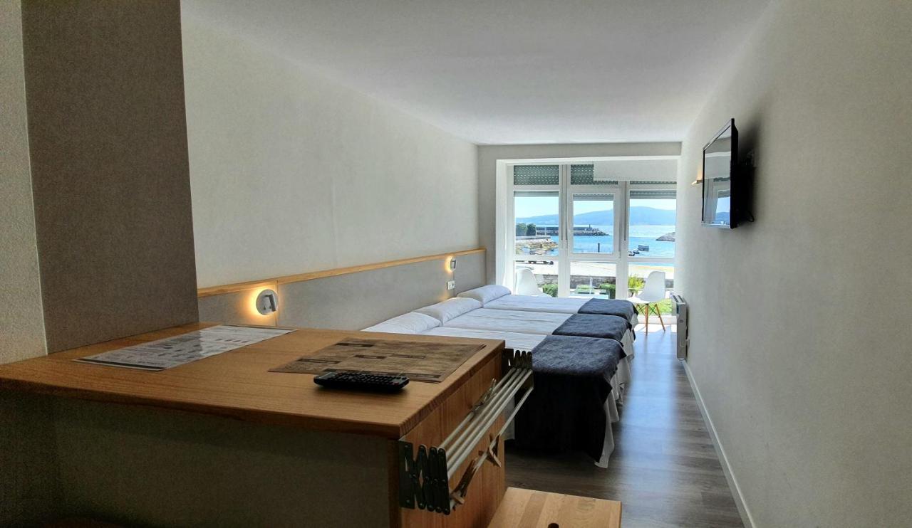 Apartamentos Costa Da Morte Muxia Exteriér fotografie A room at the hotel