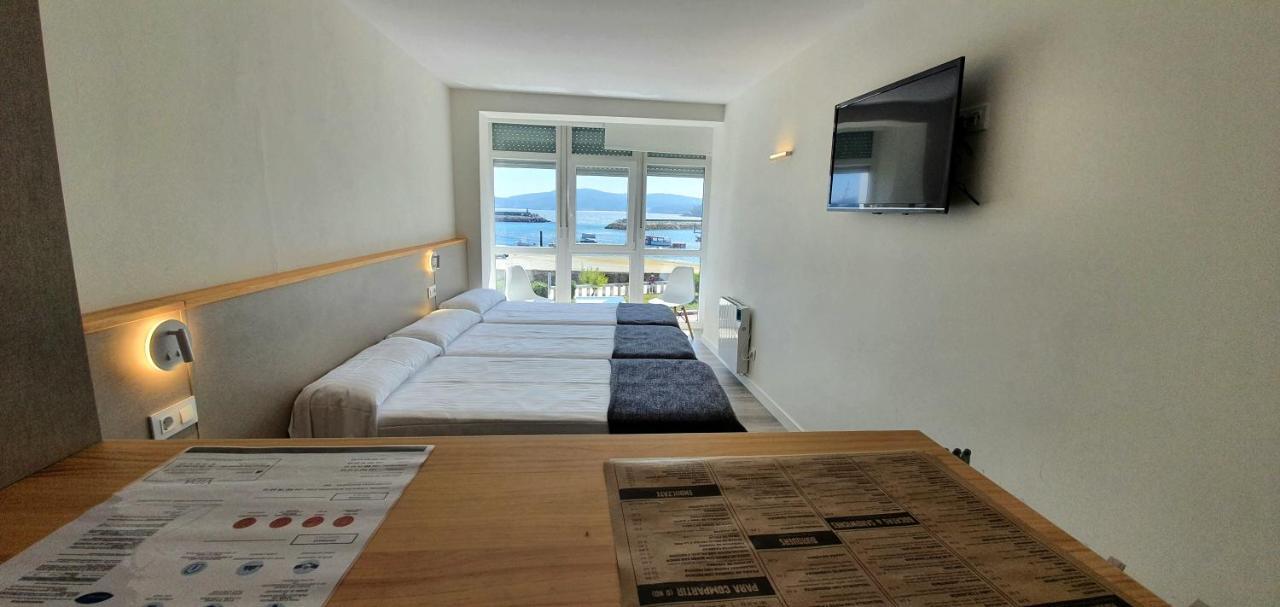 Apartamentos Costa Da Morte Muxia Exteriér fotografie A room at the hotel