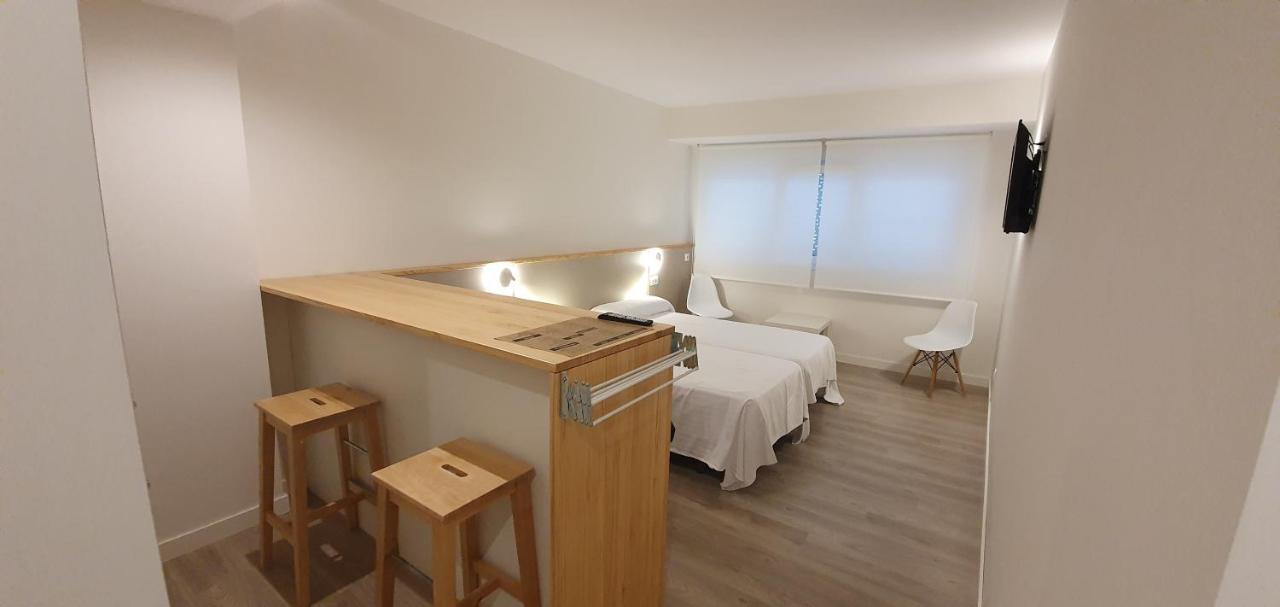 Apartamentos Costa Da Morte Muxia Exteriér fotografie A room at the hotel